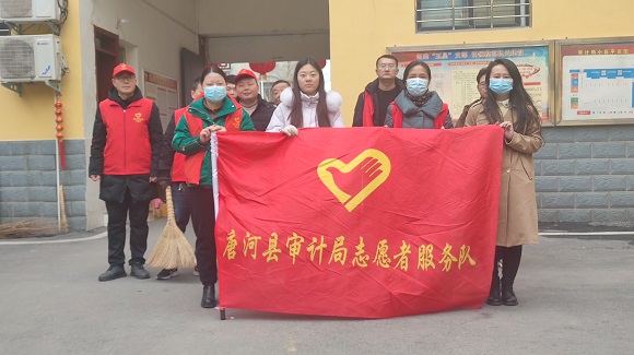 唐河县审计局开展“学雷锋·清洁家园”志愿服务活动